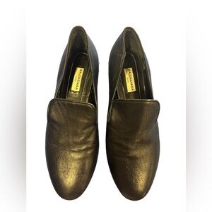 Balenciaga black loafers featuring almond toe, leather insole.